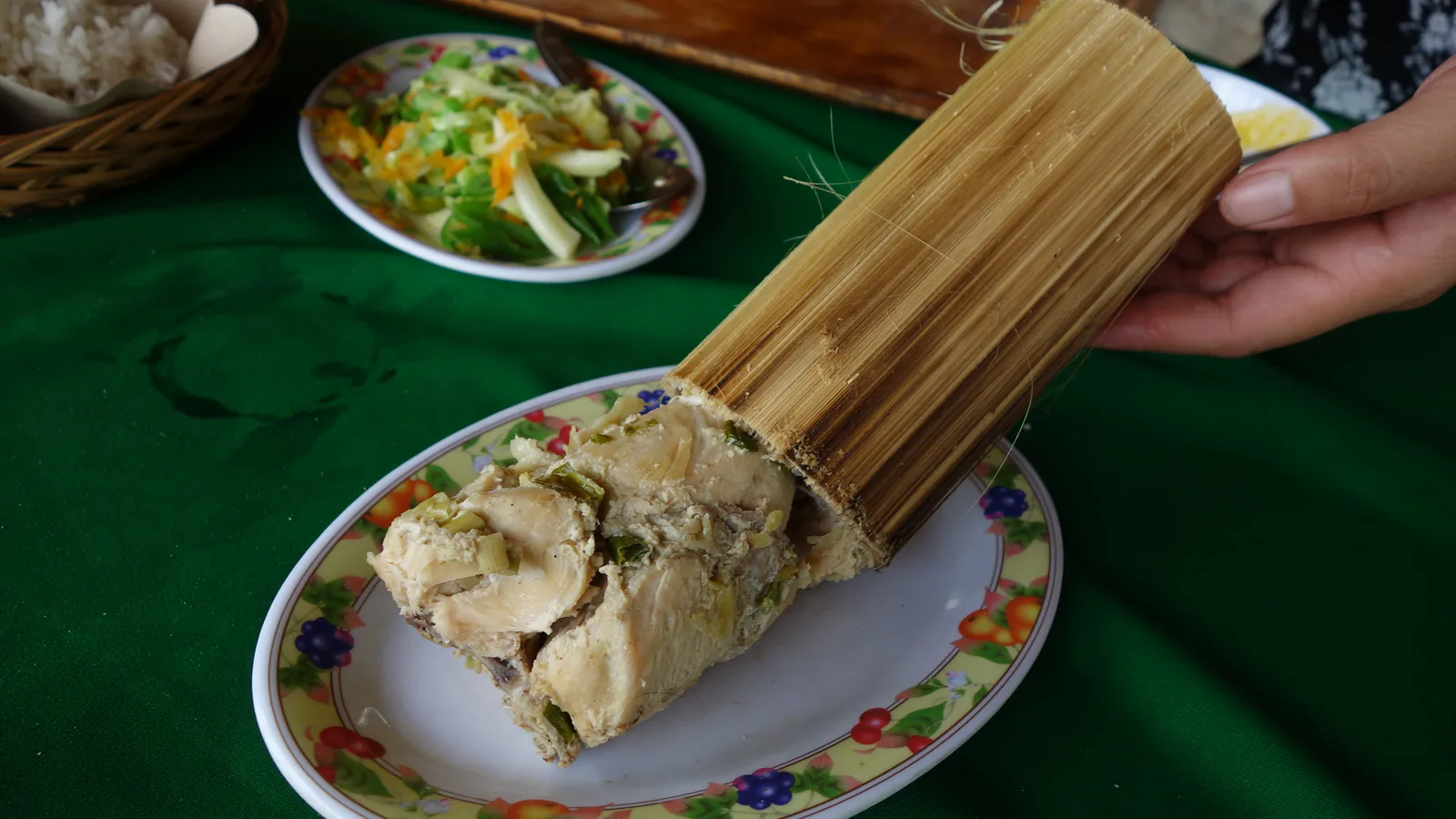 Pa'piong, chicken cooked inside a bamboo tube, served as a traditional Toraja dish